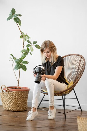 A woman preparing for her at-home photoshoot to click her professional headshots