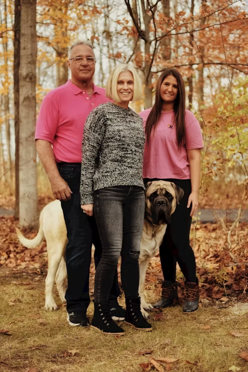 A portrait of family in an outdoor setting