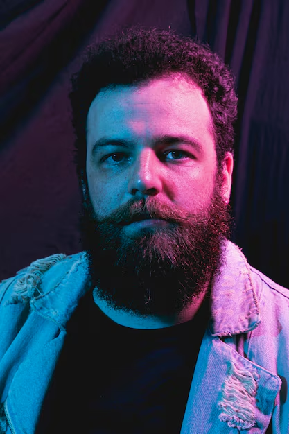 A guy posing with quirky lighting for his edgy headshots