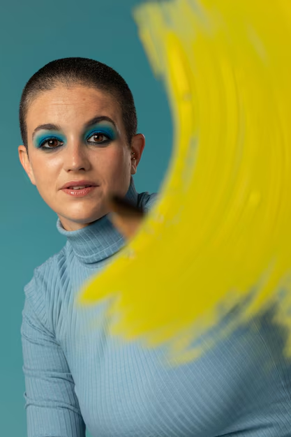 A model posing in a dramatic manner for her magazine-style headshots