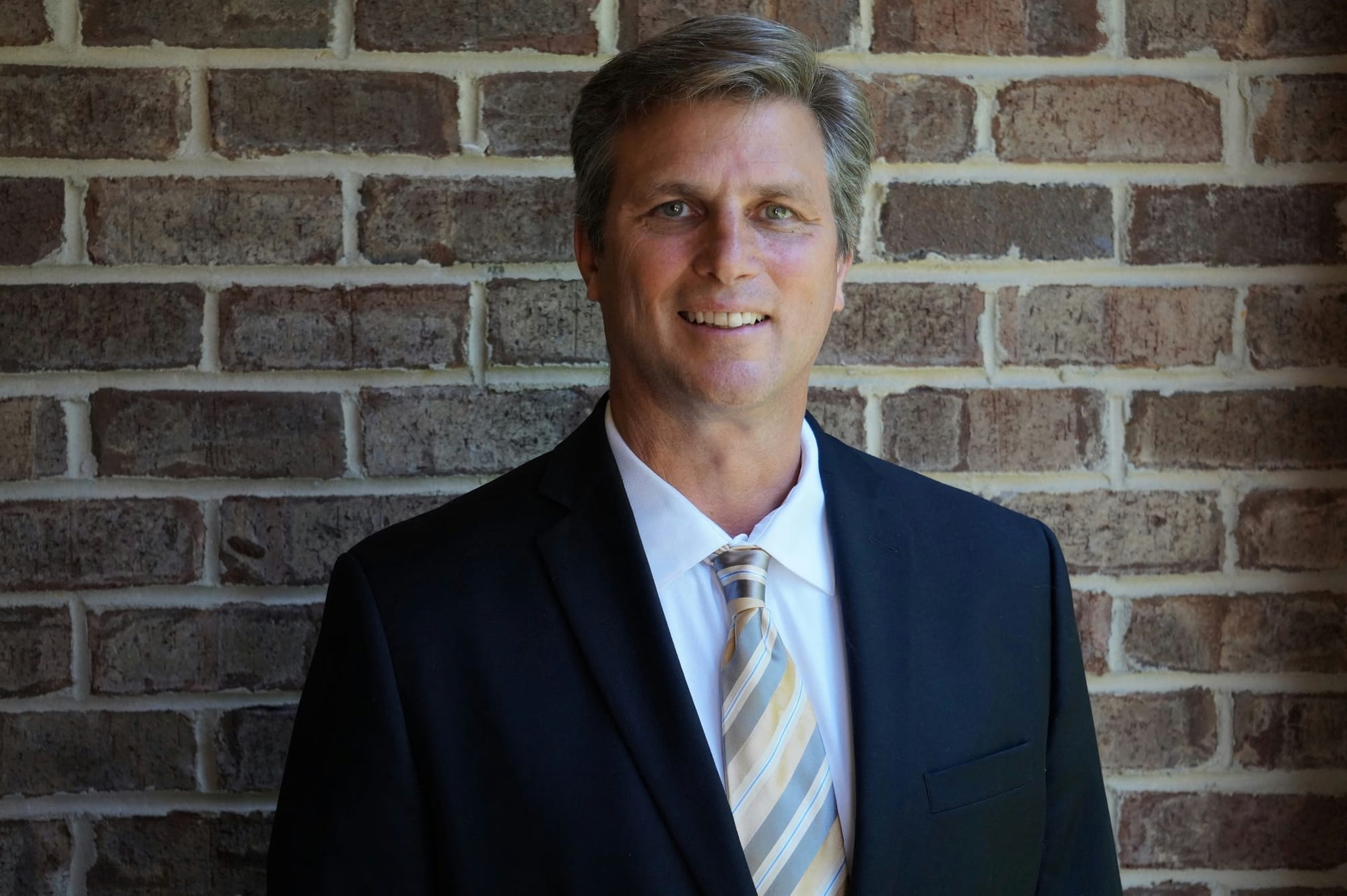 Front Profile Of A Man Who Is Posing For A Professional Headshot