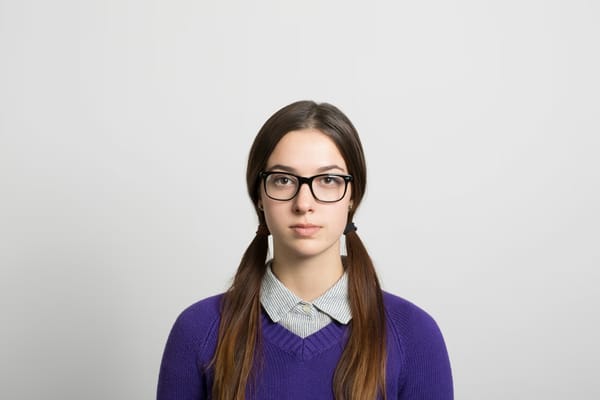 Front profile  of a woman in spectacles 